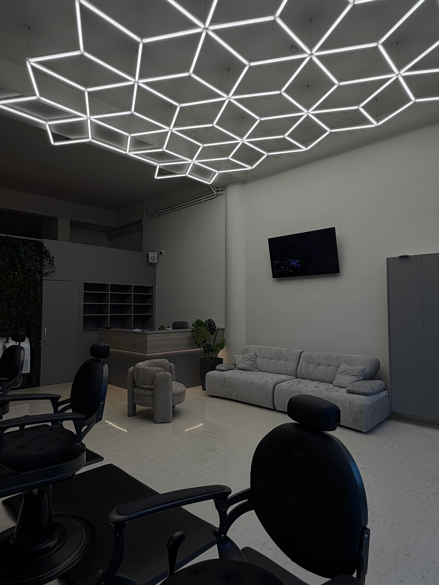 Studio 1 reception and lounge area with warm ambient lighting